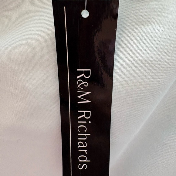 High/low black top with black and pink patterned skirt attached. - Picture 8 of 9